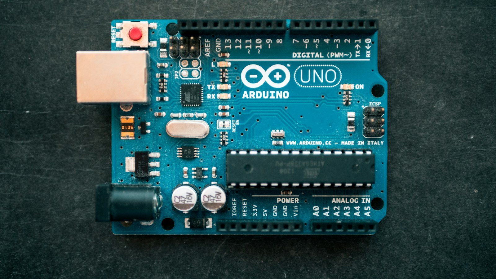 An Arduino Uno board photographed on a workbench